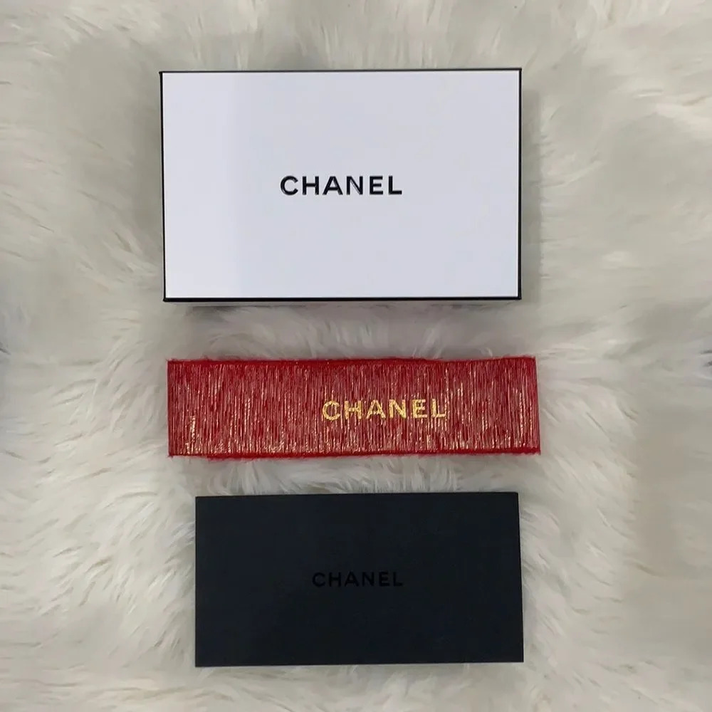 CHANEL gift box with red ribbon and envelope